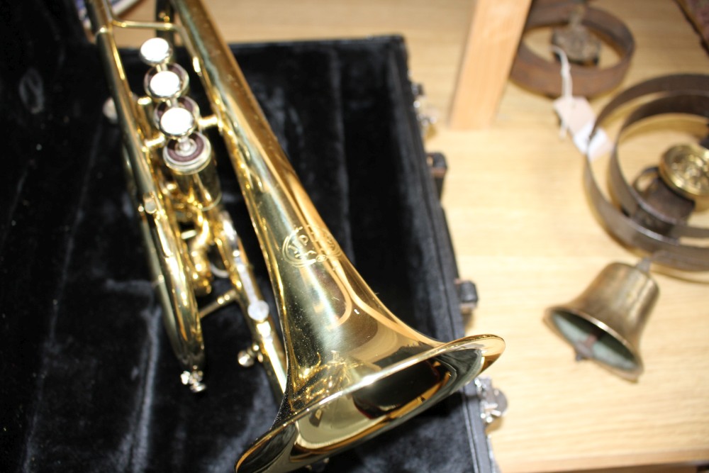 A cased Jupiter brass cornet, numbered JCR-520M, 33cm